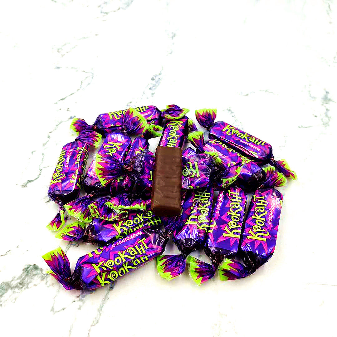 包邮俄罗斯进口kdv紫皮糖碎核桃仁巧克力花生夹心糖果