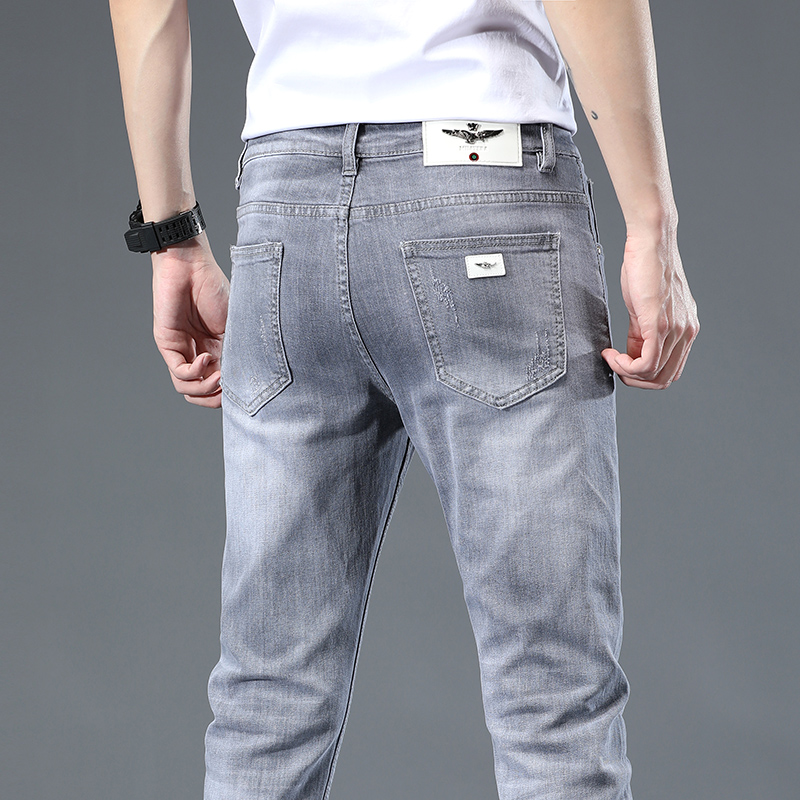 高端潮牌灰色牛仔裤男士修身小脚潮流百搭休闲2022夏季薄款长裤子