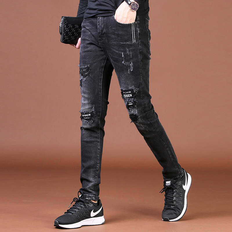 高街黑色破洞牛仔裤男修身小脚春秋季常规厚潮牌补丁潮流男士裤子