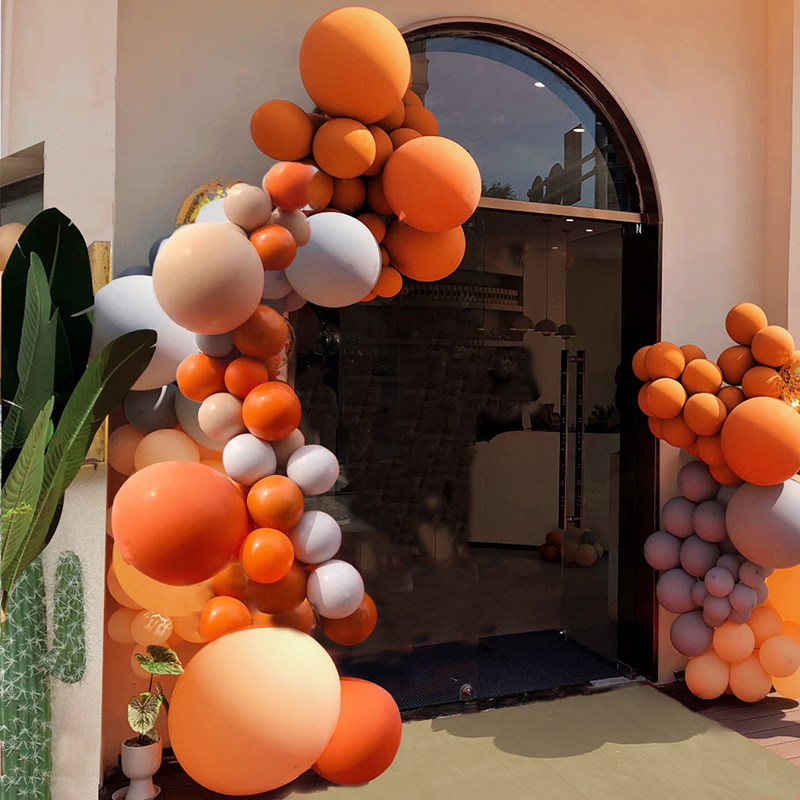 气球抖音爱马橙橘色拱门开业气氛布置服装店店庆气球