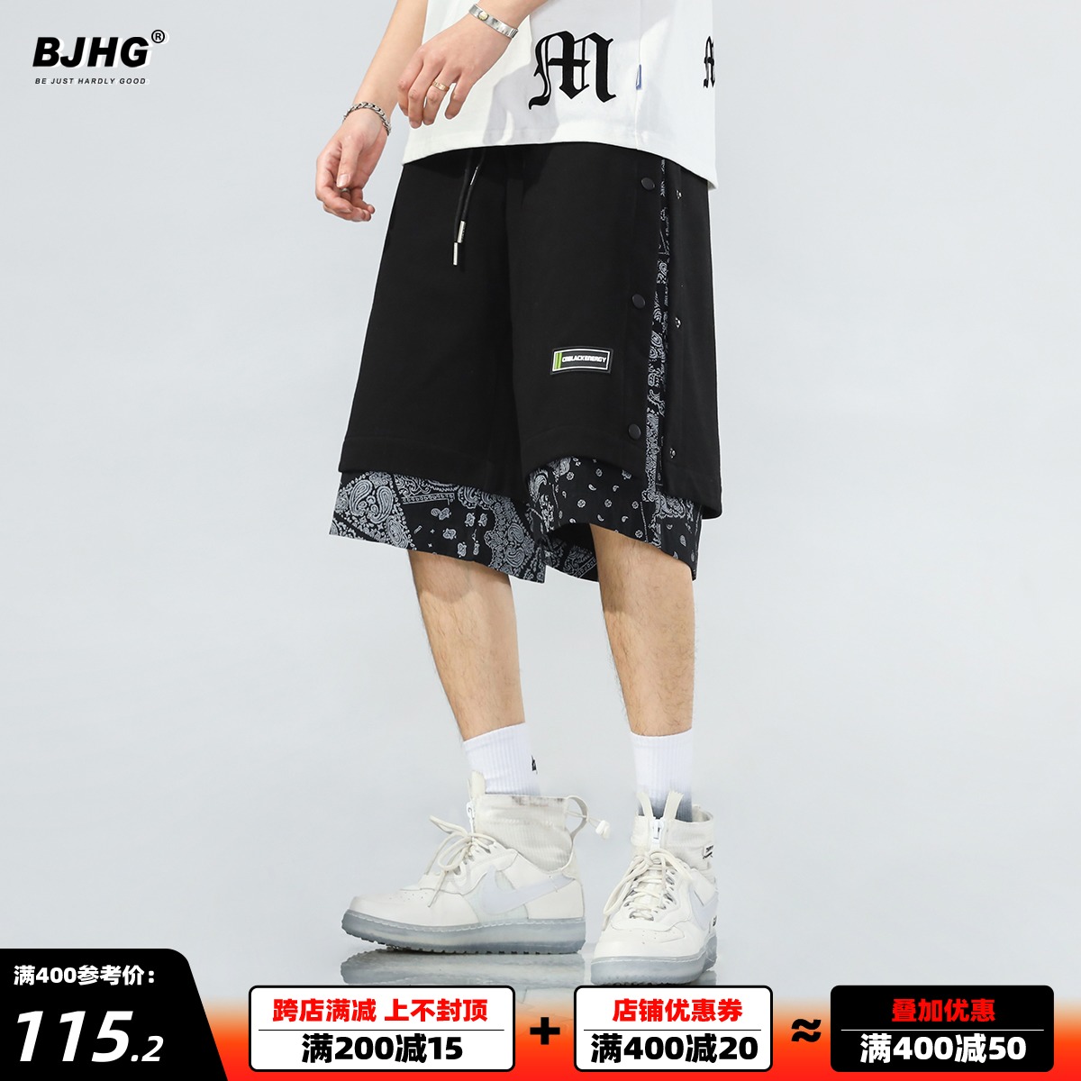 夏侧边排扣拼接腰果花休闲短裤男潮流假两件宽松运动沙滩五分卫裤