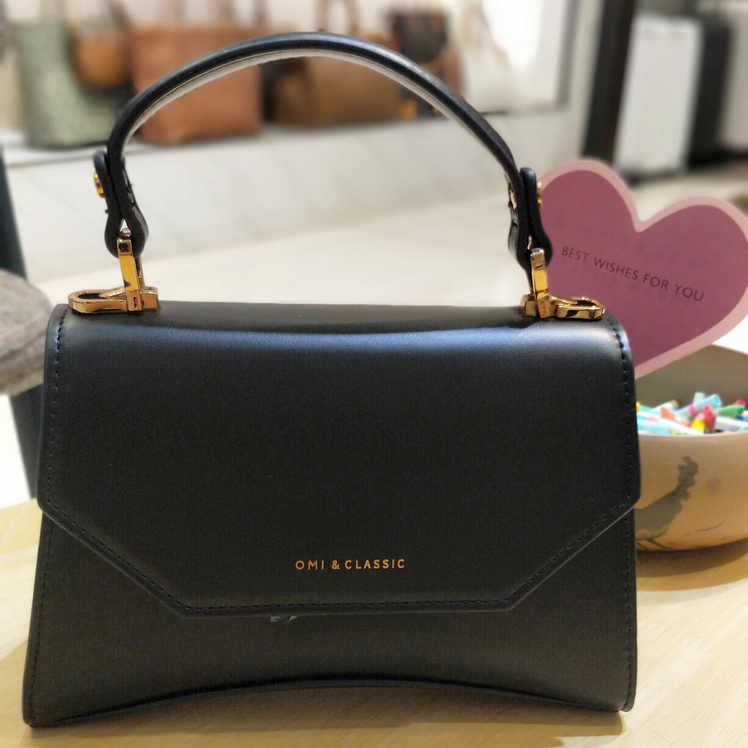 omi欧米包包万达提包单肩包欧米时尚女包手提包通用款女包