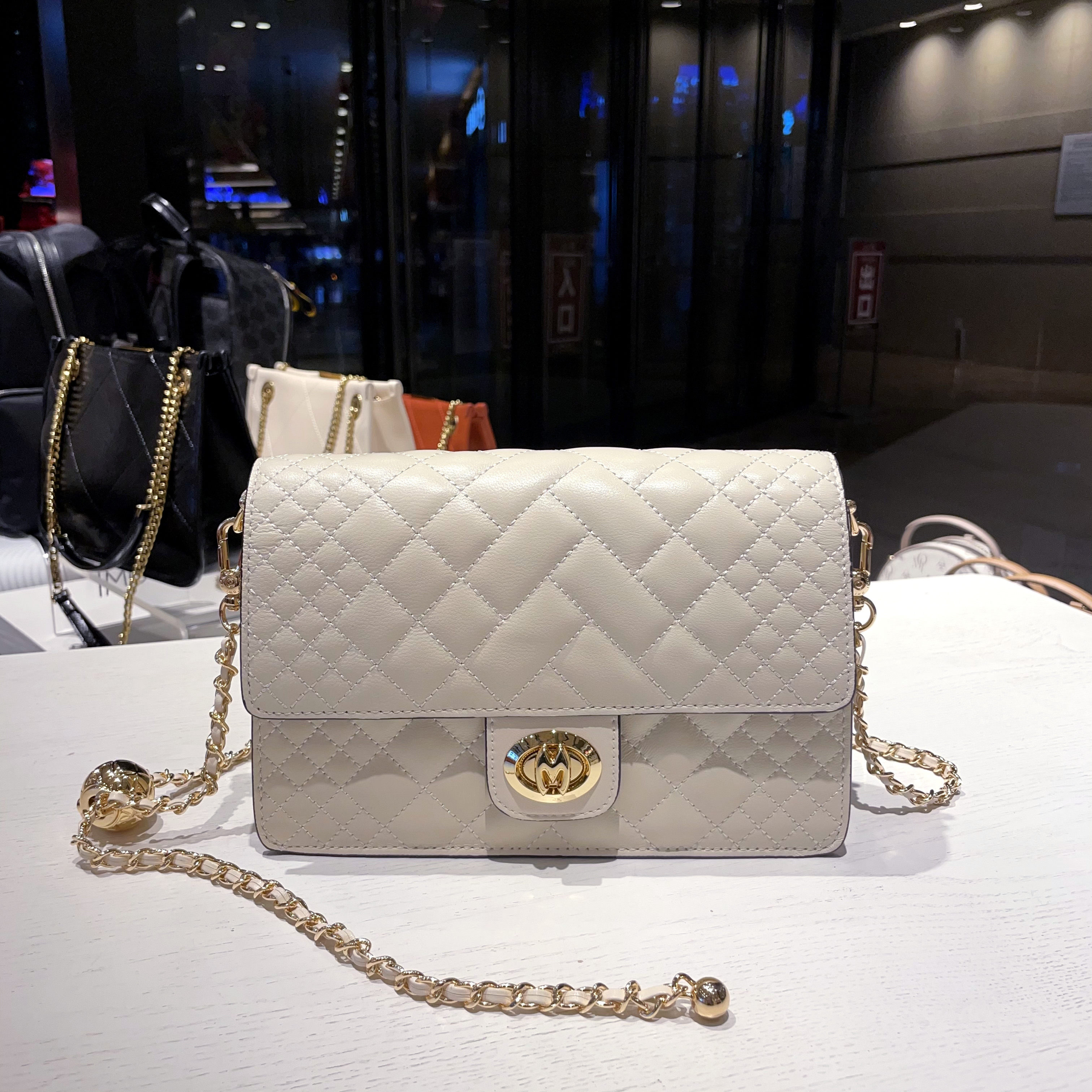 omi欧米新品时尚休闲通勤百搭羊皮小金金球单肩通用款女包