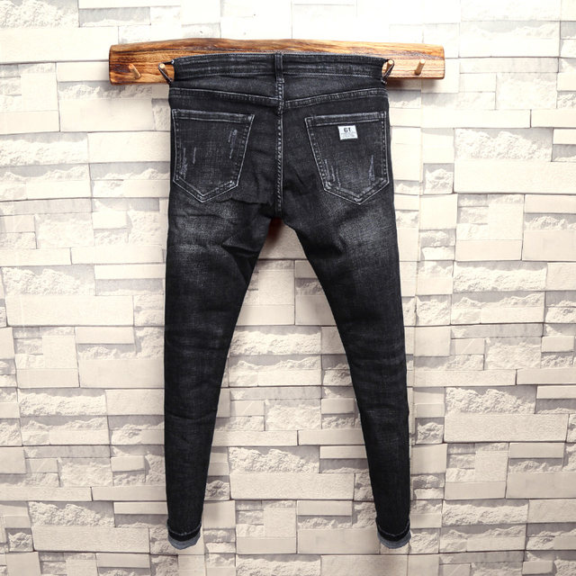 Autumn black shaved and washed distressed old jeans men's youth Korean version of the trend of slim and thin all-match pants Autumn black shaved and washed distressed old jeans men's youth Korean version of the trend of slim and thin all-match pants