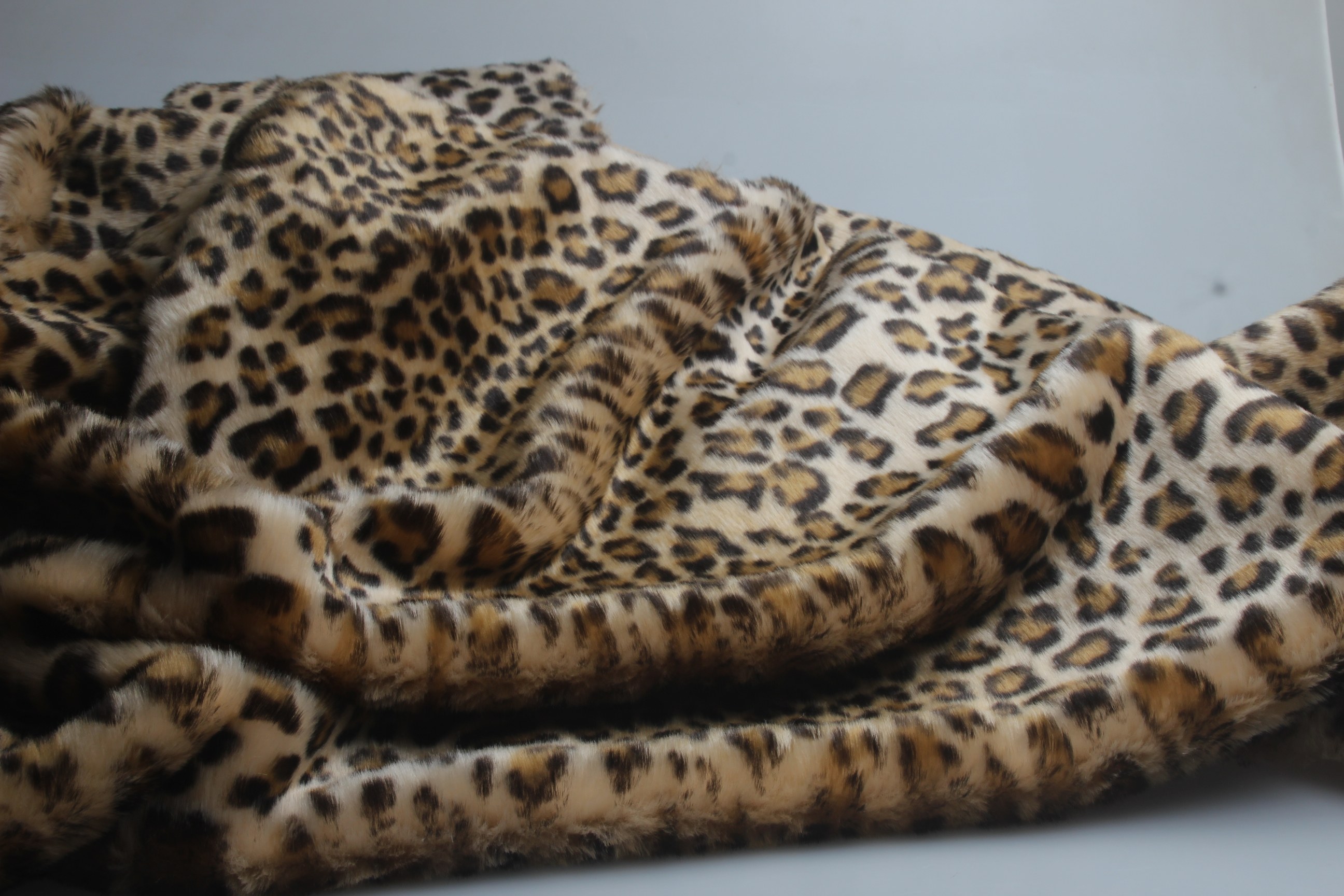 2018仿水貂毛豹纹仿皮草短毛绒人造毛布料背景布动物纹服装面料