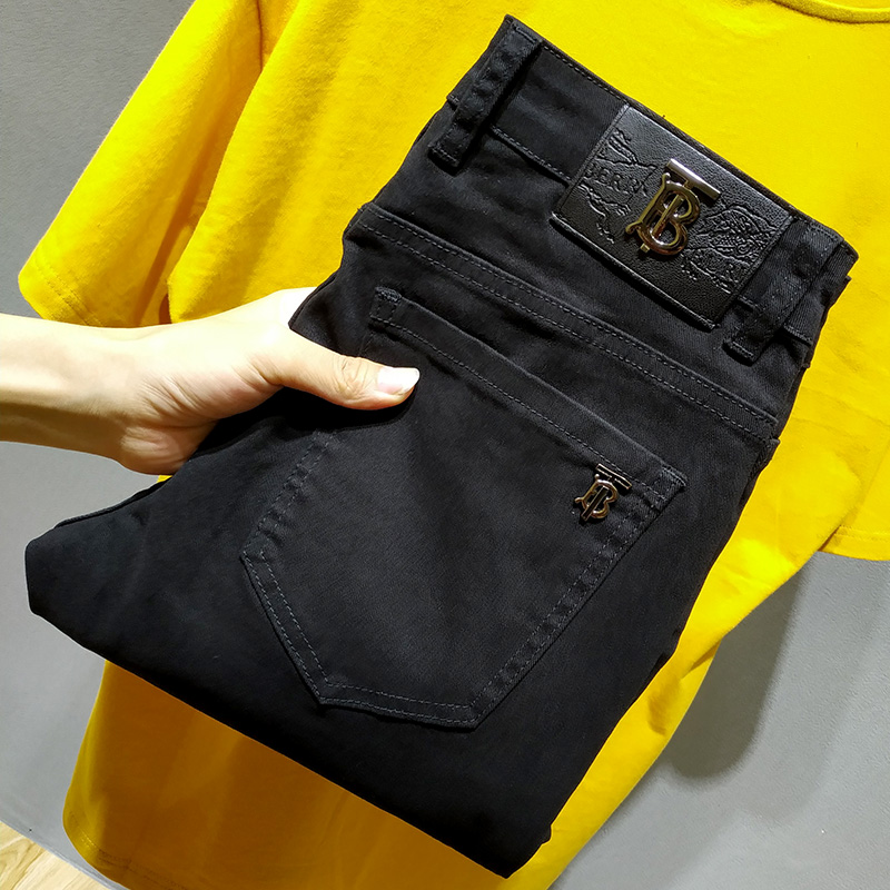 香港高端黑色牛仔裤男潮牌2022年春秋膝盖破洞男士修身小脚长裤子