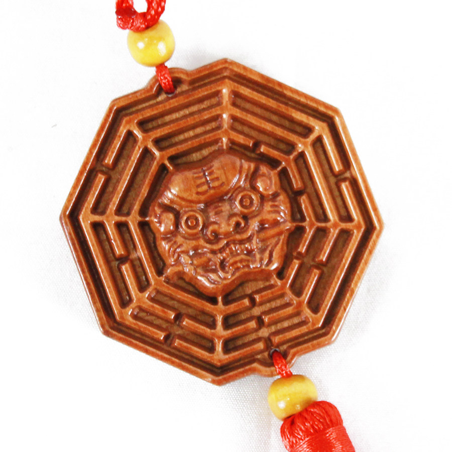 桃木兽头兽王八卦镜狮咬剑虎头化解厕所大门木雕