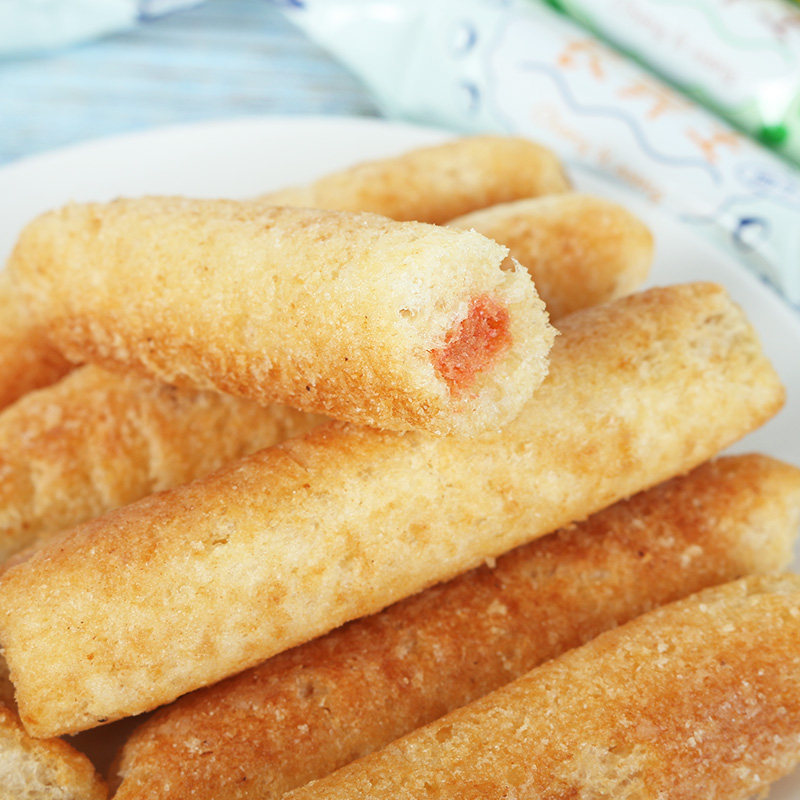 蛋黄长鼻王夹心大米米饼膨化食品休闲零食草莓膨化食品