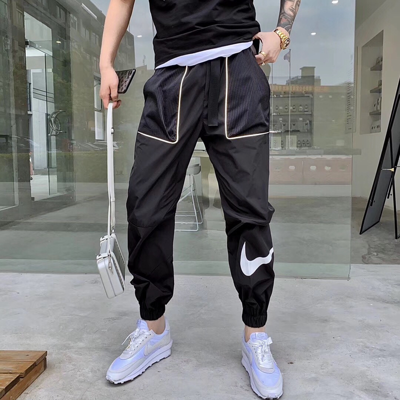 潮牌秋季新品时尚青年男装百搭休闲裤口袋装饰小脚修身运动九分裤