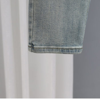 ພາກຮຽນ spring ແລະ summer ໃຫມ່ jeans ສີຟ້າອ່ອນທີ່ມີແອວສູງສໍາລັບແມ່ຍິງ 2024 slim slim ຄົນອັບເດດ: ຂະຫນາດນ້ອຍຊື່ versatile ເກົ້າຈຸດ
