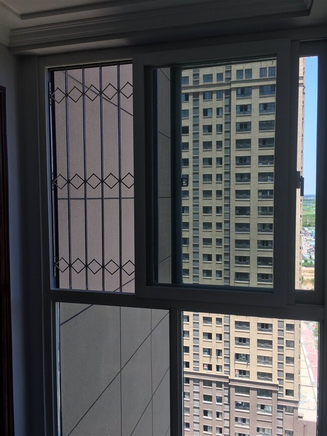 推拉防盗网儿儿童护栏收缩钢网平移定制不锈钢纱窗