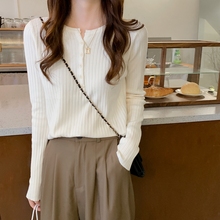 Versatile long sleeved knit top with inner layer