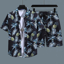 Hawaiian beach shirt suit men's loose short sleeved Thai fashion brand Hainan tourism ice silk half sleeved floral shirt