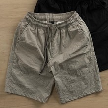 Extra large 300 pound ice silk shorts for men's summer thin quick drying beach straight tube loose casual two-piece shorts