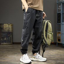 High end trendy brand quick drying ice silk sports casual pants for men