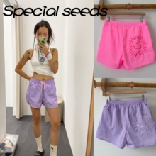 A niche Korean version of elastic waist embroidered shorts for casual wear