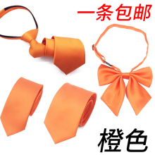 Orange men's tie and women's collar flower