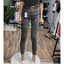 Broken hole high waisted jeans for women in the autumn of 2024, new slim fit and slimming look, oversized elastic tight pencil cropped pants trend