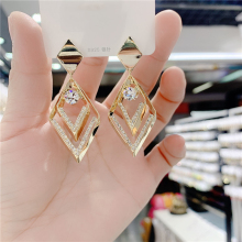 Geometric diamond earrings for 2023 trendy round face slimming off