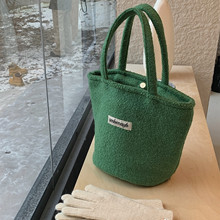 Winter new green woolen tote bag, large capacity niche commuting bag, portable plush water bucket bag, women's ins