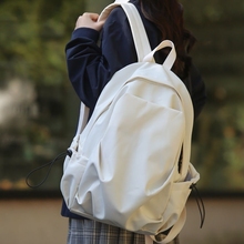 Travel backpack ins college student minimalist backpack Korean version versatile large capacity junior high school casual backpack nylon
