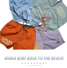 Shaka surfing beach shorts with waterproof and quick drying function