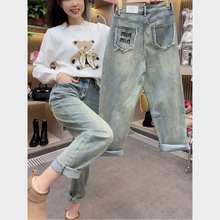 Oversized women's jeans are popular this year with stretch pants