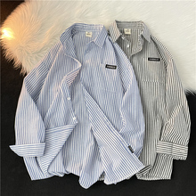 Striped long sleeved trendy shirt for men in autumn