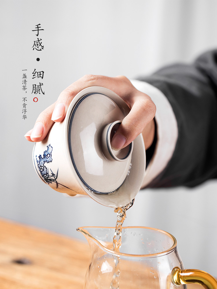 Jingdezhen blue and white tureen single tea is pure manual effort against the hot tea cup hand - made orchid plant ash tea sets