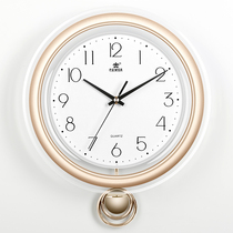 Overlord's creative swing clock modern Jane about the soft clock in the Nordic wall living room Golden house clock