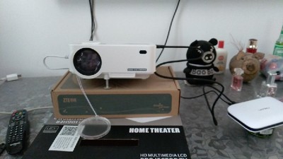 目前看来请问光米T60A家用投影仪怎么样，好不好用？白天看清晰吗？