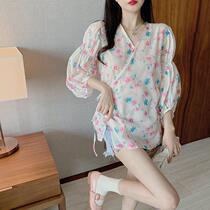 Early autumn dress 2020 light mature wind ins French new super fairy V-neck lace-up small shirt floral sunscreen shirt top T