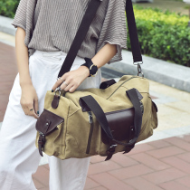 Manjianghong 2019 new canvas travel bag portable large capacity luggage mens business travel waterproof lightweight womens bag