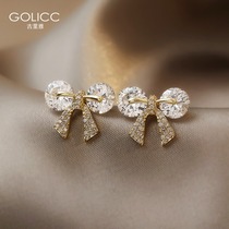 Bow simple small earrings female temperament earrings 2021 New Tide senior sense light luxury Silver Needle