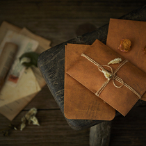 European style vintage old creative kraft paper envelope Postcard storage bag Fire paint envelope photography shooting props