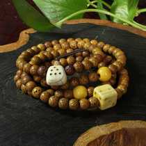 Tibetan old Star Moon Bodhi with Buddha head beeswax beads Golden Hammer treasure into auction C3077