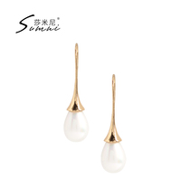 sumni samini minimalist fashion temperament 18K bag gold drop shaped artificial pearl long earrings nail decorated female