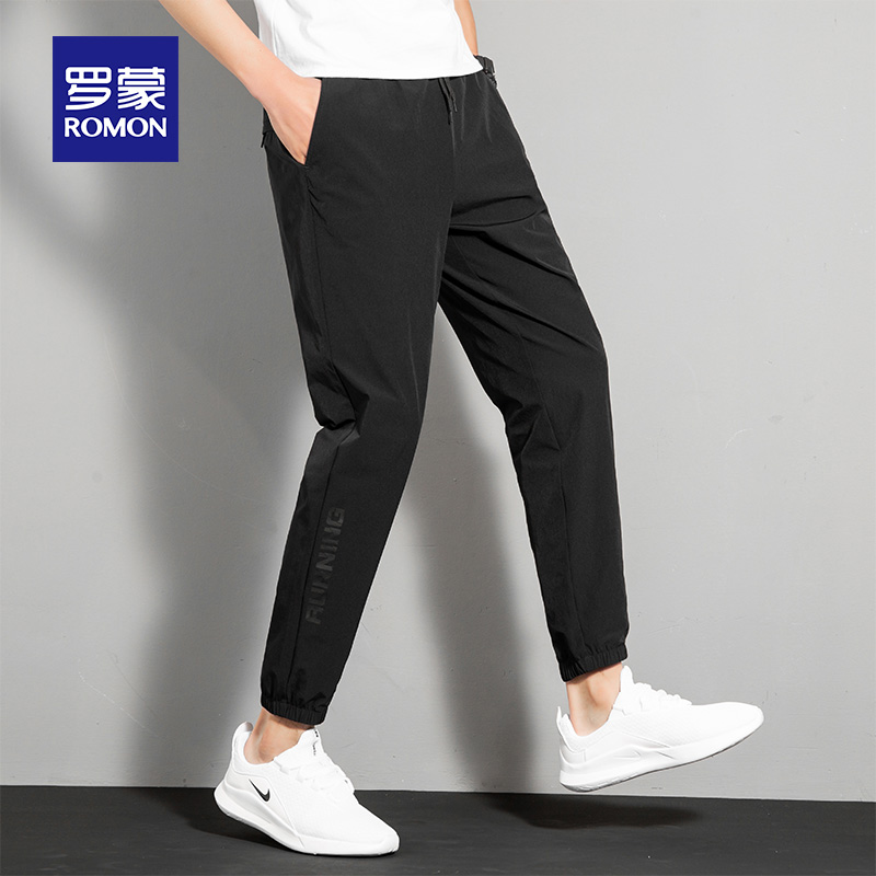 Romon spring and autumn slacks mens Korean version of the trend of wild leg sports elastic tide brand loose lace-up pants