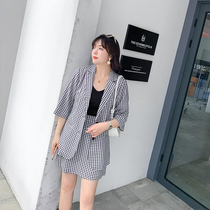 Qisuo 2020 autumn dress new leapfrog mid-sleeved single-row button grid big size female suit half-skirt fat mm thin