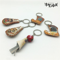 Inner Mongolia specialty hand drawn a variety of patterns cowhide making ethnic doll key chain Mobile phone chain small pendant