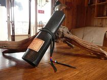 Hand made with a head layer of cow leather pen bag