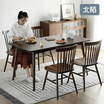 Dining table and chair combination solid wood modern simple rectangular small family table Nordic black walnut dark table