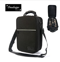 European and American 100 g drop b tone black tube clarinet containing portable suitcase hand double shoulder backpack accompanying light body box
