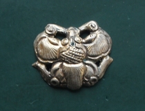 An old silver gilt butterfly flower ornament