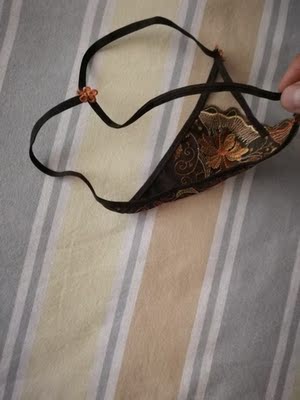 穿上挺性感，她的身材正合适，如果能改成绑带的那种就更完美了