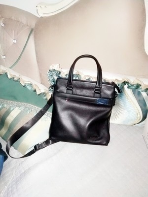 目前看来KHARONO男包怎么样，质量很差是真的吗