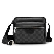 Hong Kongs new genuine leather printed male clad cow leather large capacity single shoulder bag mens closeted satchel bag retro tide