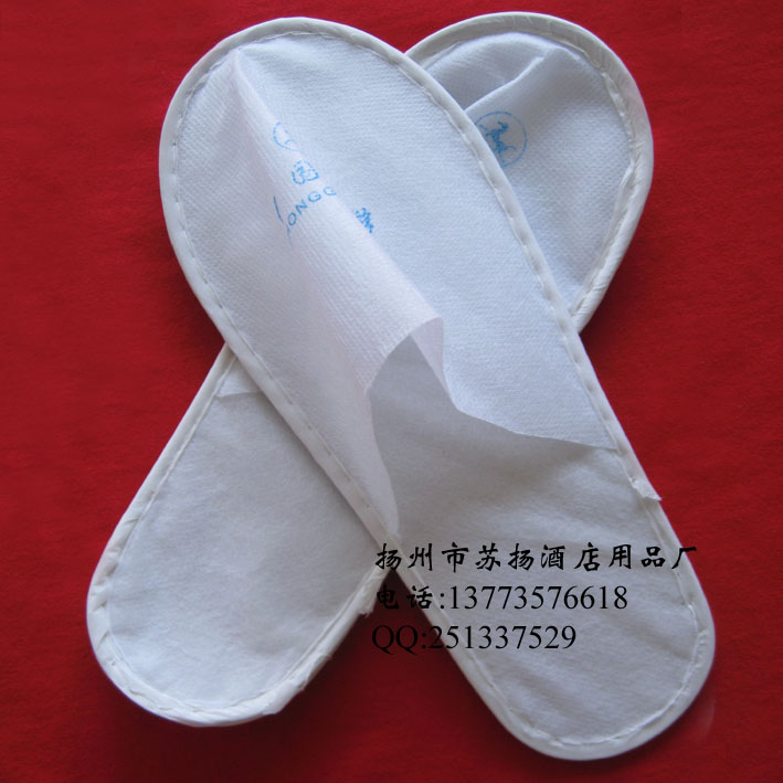 Special hotel hotel room supplies disposable slippers non-woven silk slippers China travel general slippers shoes slippers