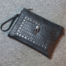 Mens handbag Korean version skull fashion rivet clutch trend hand grab bag shoulder oblique cross bag Womens casual hanging bag