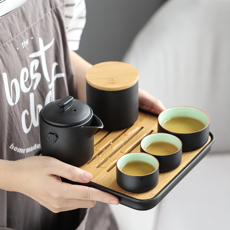 Su ceramic Japanese black pottery to crack a pot of a three portable travel kung fu tea set